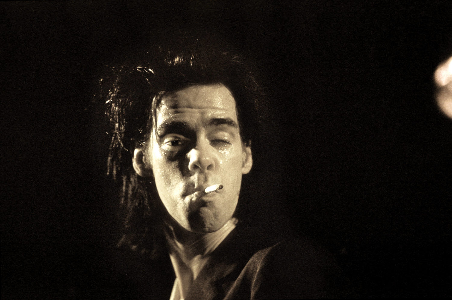 Nick Cave bei einem Konzert, 1990. Foto: Imago/Brigani-Art/Brigitte Heinrich